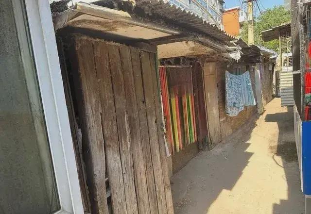 乱建居民想提升小区环境的愿望实现了马竞合作伙伴拆除700平方米私搭(图5)
